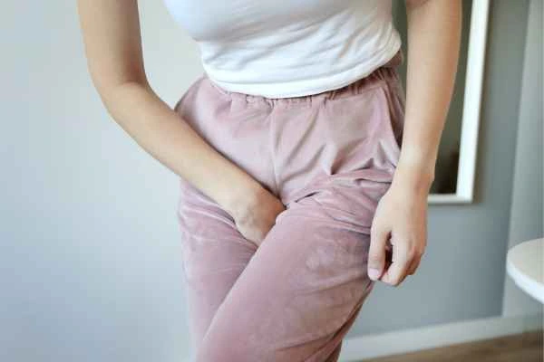 older woman running to the toilet because of urinary incontinence Harwich