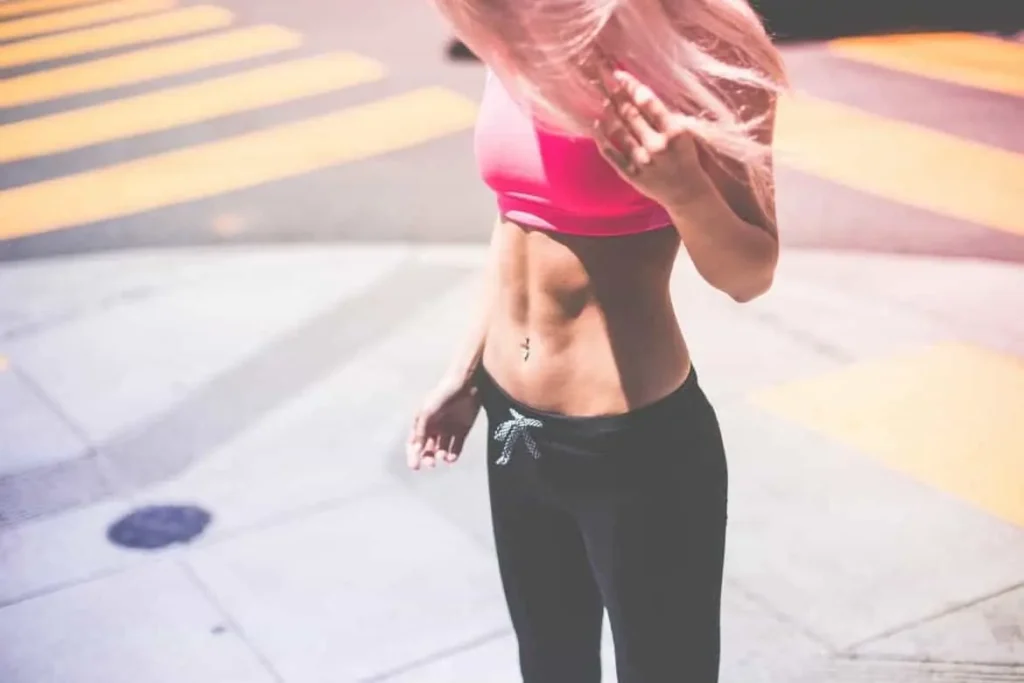 Woman with toned stomach after LA-EMS Body Sculpting Treatment Harwich 